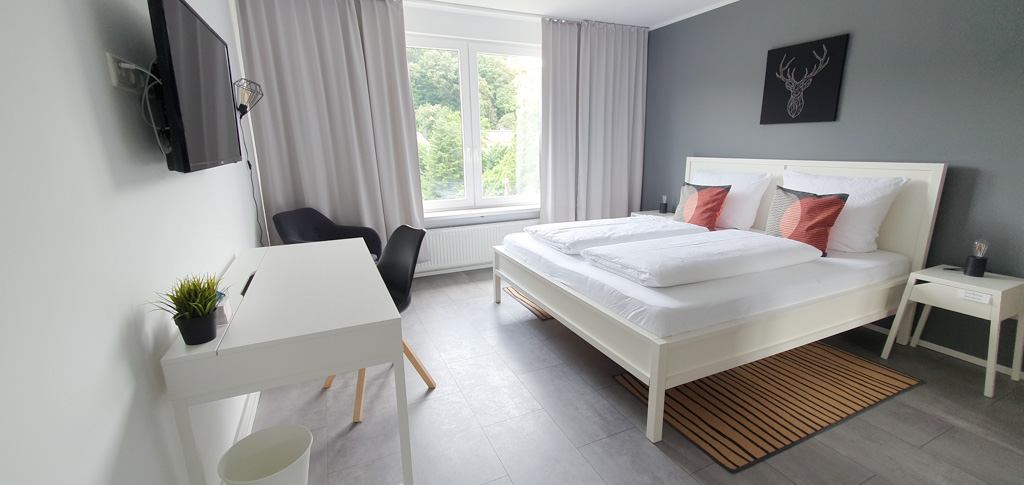 Schlafzimmer eines Ferienhauses in Wuppertal