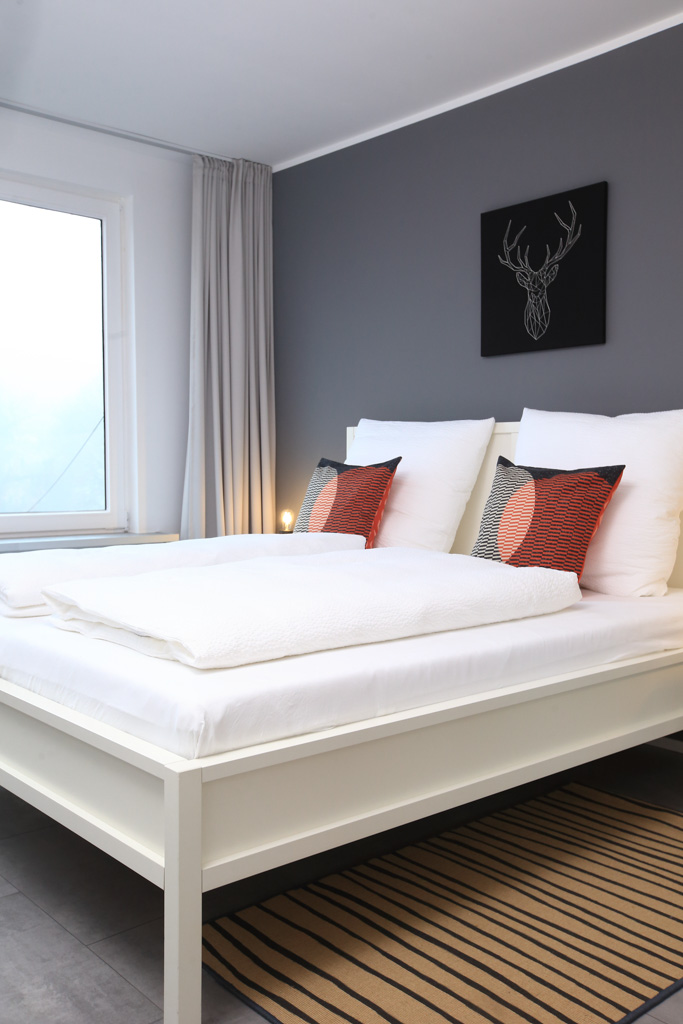 Schlafzimmer eines Ferienhauses in Wuppertal